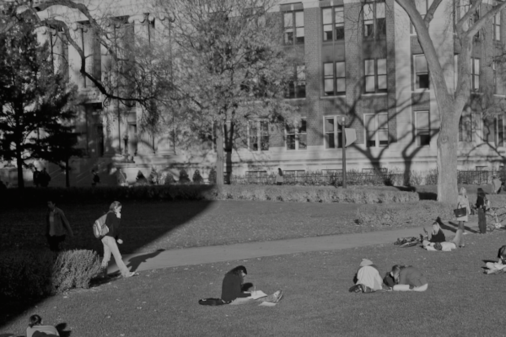 Black and white image of a college campus quad