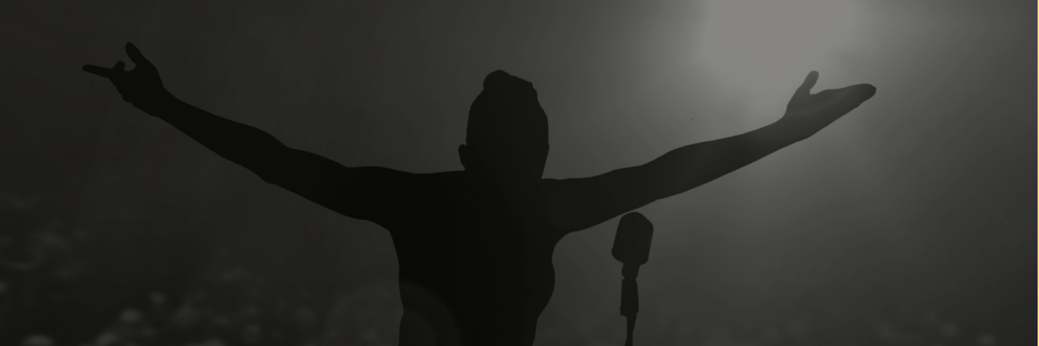 silhouette of a singer on stage
