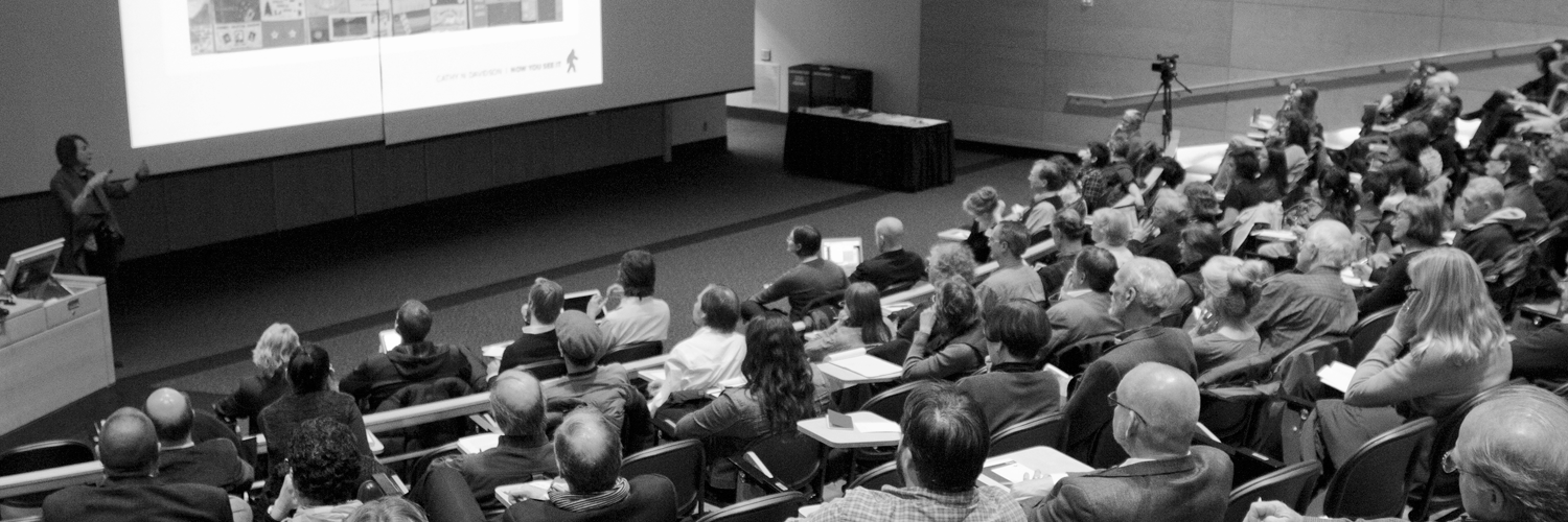 lecture hall filled with audience members