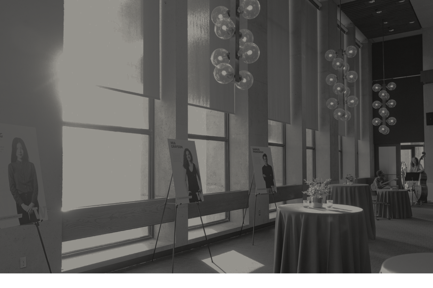 Black-and-white image of windows and light fixtures in the Walker-Ames room.