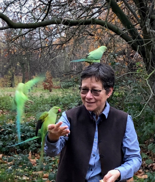 Image of Anna Tsing with birds outside