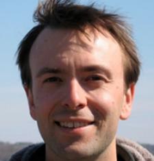 A close-up image of Jesse Oak Taylor outside.