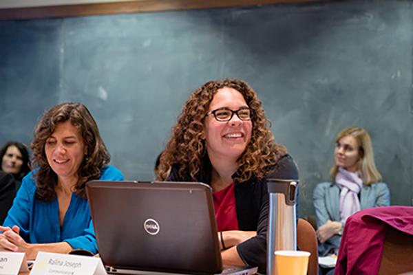 UW faculty Ralina Joseph and Sonnet Retman sitting at a meeting of Women Investigating Race, Ethnicity, and Difference