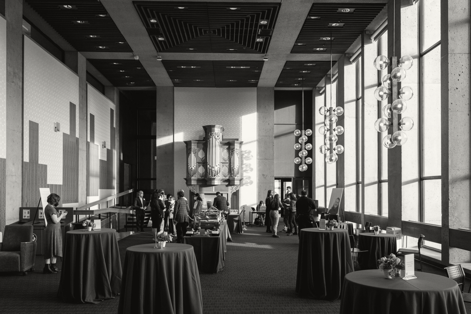 A black-and-white image of the Walker-Ames reception room in Kane Hall.
