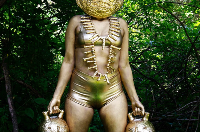 Person painted in gold art