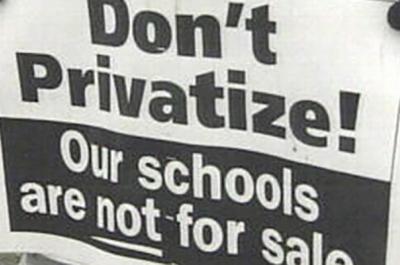 Photo of a sign with the words Don't Privatize! Our schools are not for sale.