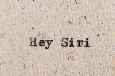 "Hey Siri" typed on parchment paper