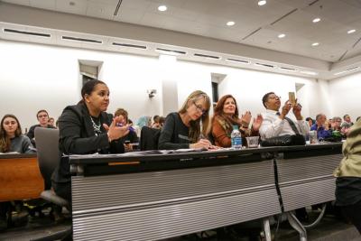 Carceral justice panel presenting at a long desk