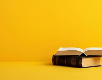 two books against a yellow backdrop