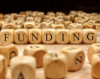 wooden blocks spelling funding