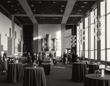 A black-and-white image of the Walker-Ames reception room in Kane Hall. 