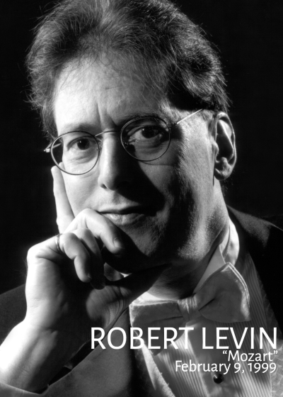 A black and white image of Robert Levin looking into the camera while leaning his head on his hand.