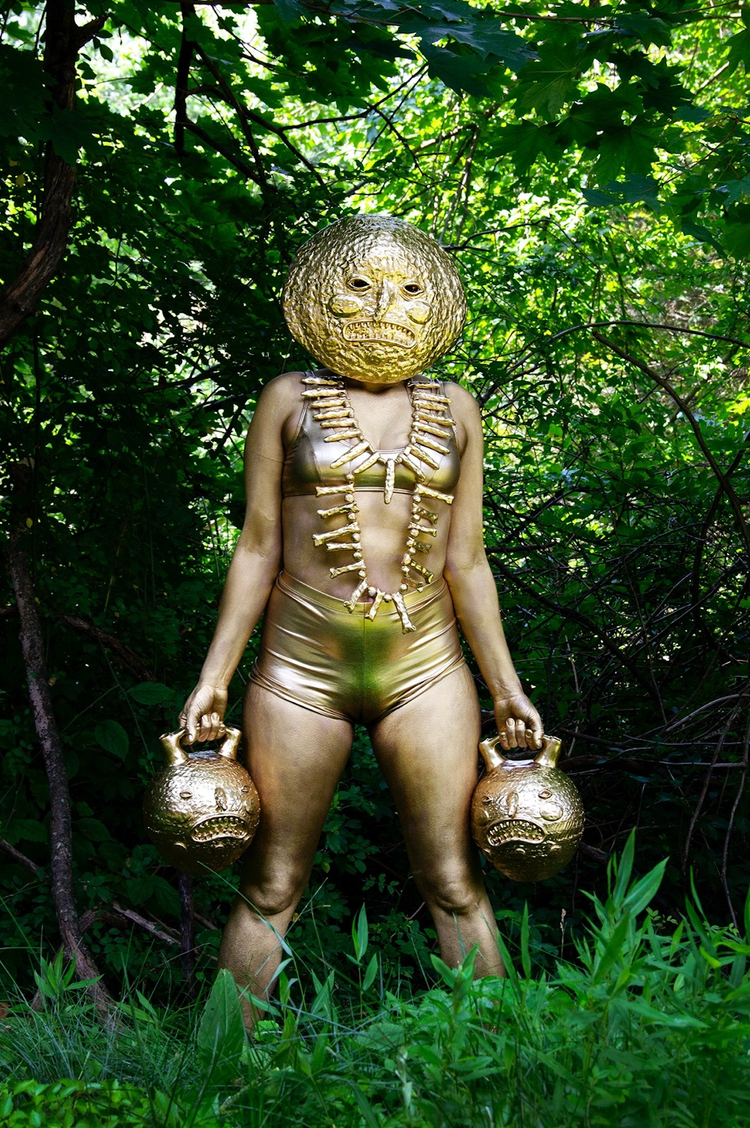 Person painted in gold art