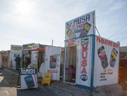 Cellphone Repair Shop built from Shipping Container, Joe Slovo Park, Cape Town, South Africa (Wikimedia Commons)