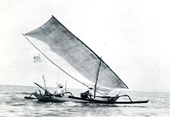 A black and white image of a Javanese outrigger canoe.