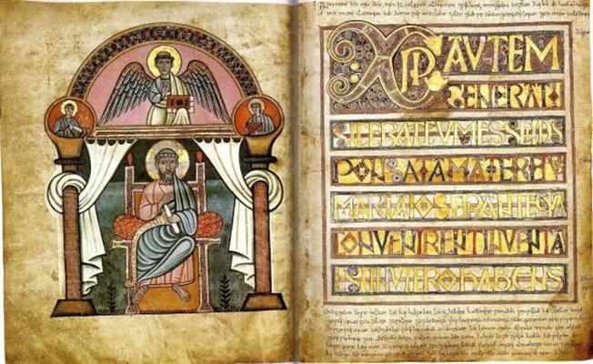 A close-up of a page from the Stockholm Codex Aureus with a drawing of Saint John on one side and words on the other.