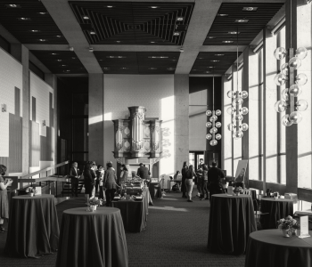 A black-and-white image of the Walker-Ames reception room in Kane Hall. 
