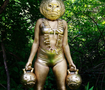 Person painted in gold art