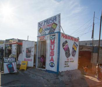 Cellphone Repair Shop built from Shipping Container, Joe Slovo Park, Cape Town, South Africa (Wikimedia Commons)
