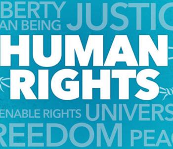 White text reading "Human Rights" set against a blue background made up of associated words like "Freedom" and "Justice"