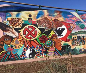 "Quetzalocoatl" is the first collective mural painted in Chicano Park, San Diego, in 1973. The artists, Guillermo Aranda, Salvador Barrajas, Jose Cervantes, Sammy Llamas, Bebe Llamas, Victor Ochoa, Ernest Paul, Arturo Roman, Guillermo Rosete, Mario Torero, and Salvador Torres, unify mythical images grounded in Indigenous stories of the southern California border region. Photo courtesy Lydia Heberling
