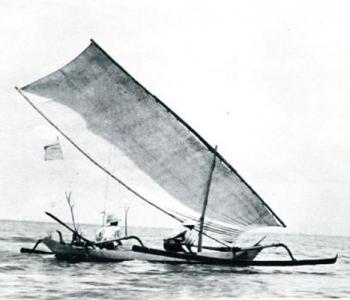 A black and white image of a Javanese outrigger canoe.