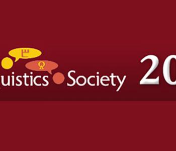 The logo of the 2014 Slavic Linguistics Society on a maroon background.
