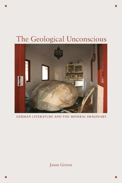 The cover image of this book shows a photo of a large rock inside a house's living room.